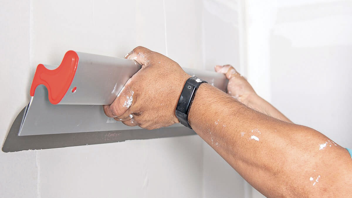 Skimming blade finishing process